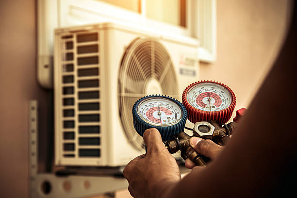 Professional Hvac technician working in Russiaville, IN